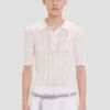 Frill polo top in white Frill polo top in white