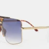 Oversized metal and acetate frame in gold havana Oversized metal and acetate frame in gold havana